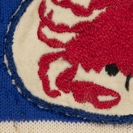 Détail d'un maillot de cycliste porté lors du Tour de France de 1935 par Julien Moineau (1935 ; Nice, Musée National du Sport) - Photo : INP